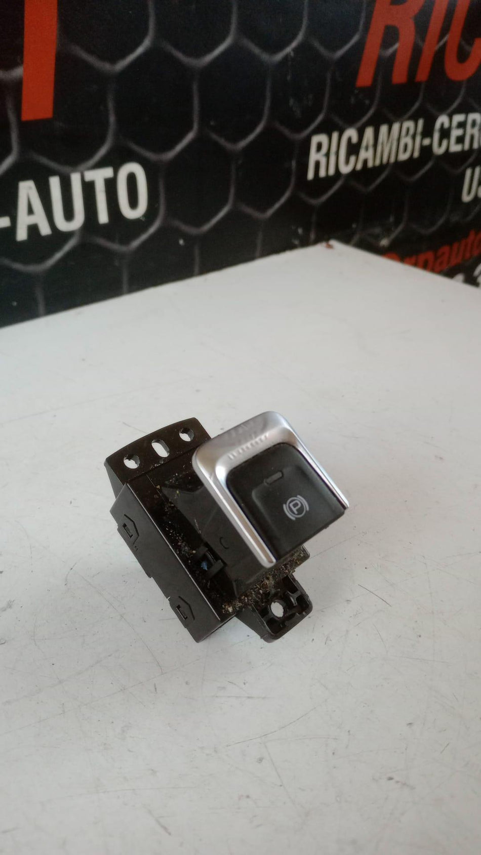 Pulsante freno di stazionamento EVO 5 Serie (23>)